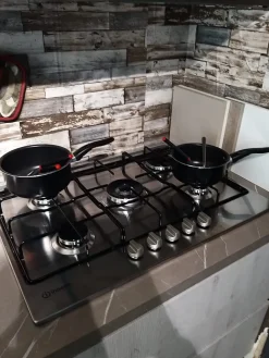 Cucina moderna lineare grigio in laminato materico Ginevra^Aran Outlet