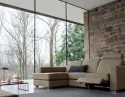 Doimo Salotti Divano con penisola pelle in poliuretano   in Offerta Outlet- Divani