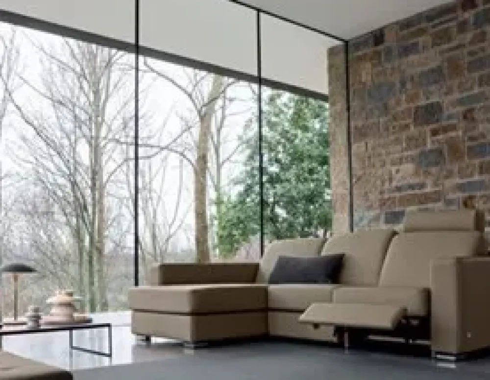 Doimo Salotti Divano con penisola pelle in poliuretano in Offerta Outlet- Divani