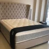 Letto imbottito con giroletto Letto testata alta capitonè sottocosto  a prezzo scontato^Artigianale Discount
