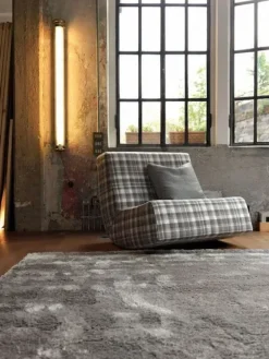 Doimo Salotti Poltroncina Dondolami Con seduta fissa a prezzi outlet- Poltrone