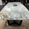 Tavolo con piano in marmo sagomato di a PREZZO OUTLET^Poliform New